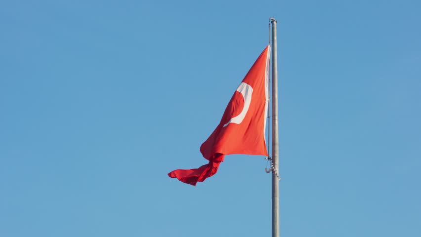 4k, Slow motion, The Turkish flag is fluttering in the wind, against the blue sky, close-up | Shutterstock HD Video #1103937253