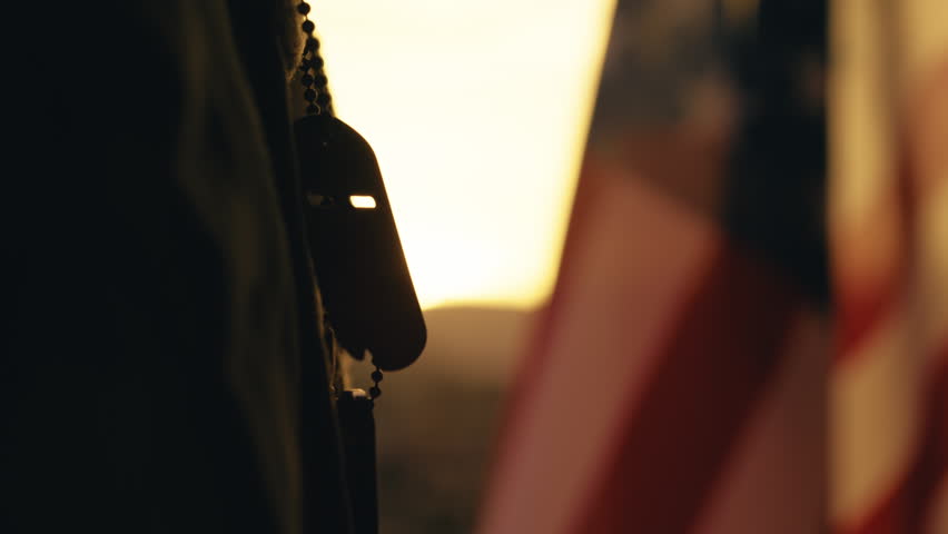 Silhouette of Military for Memorial day touch his plate outdoor