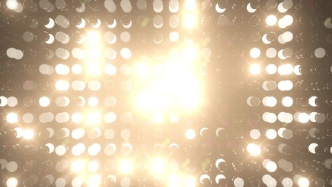 4K bright flashing stage lights wall patterns with flares and small particles. Two versions - lines or radial. Each clip is perfect loop. Video de stock