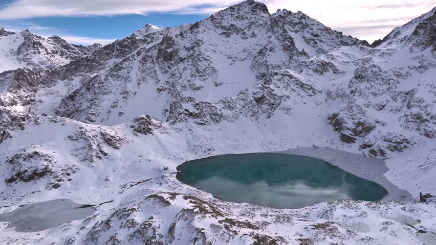 drone flew over the glacial mountain. Shooting from a drone from a bird