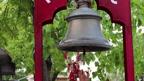 hindu holy bell at temple at evening from flat angle video is taken at santoshi mata mandir jodhpur rajasthan india on May 05 2023.