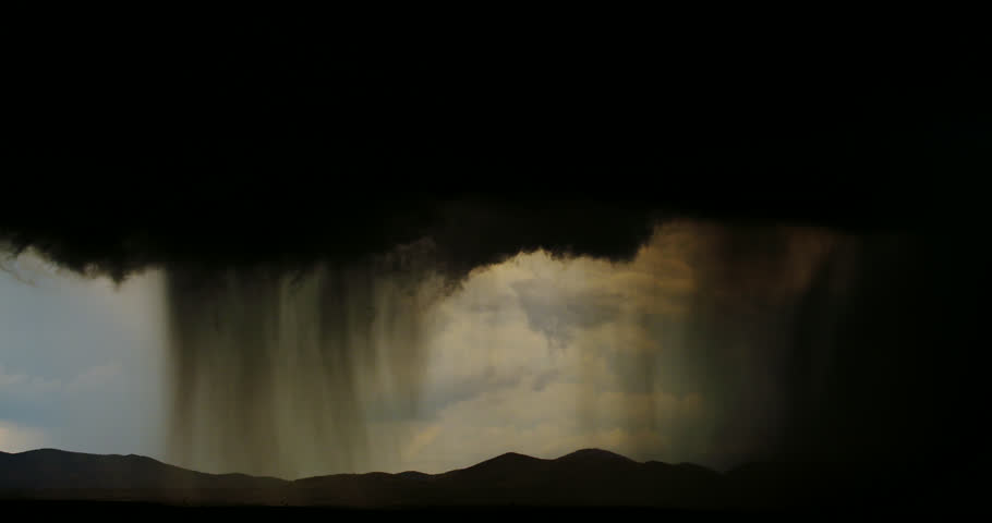 Monsoon-moisture fueled thunderstorm with intense desert downpour.