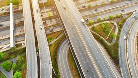 Interchange roads are characterized by a combination of ramps, bridges, and overpasses that allow vehicles to navigate safely and efficiently between different levels and directions of travel. Drone
