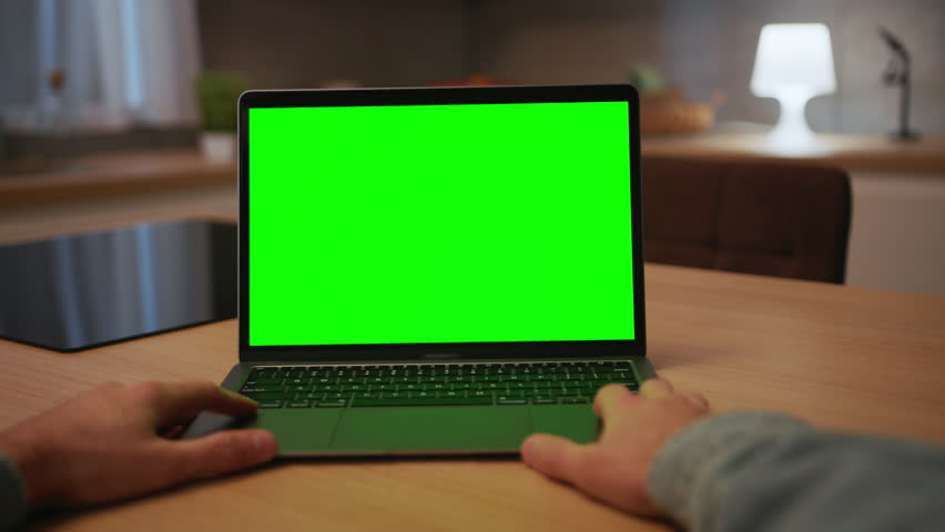 Man hands on laptop keyboard. Footage of unrecognizable businessman typing on keyboard of computer. Man using gadget with green screen. Mockup concept. Chroma key. Modern technology. Indoors Royalty-Free Stock Footage #1103973947