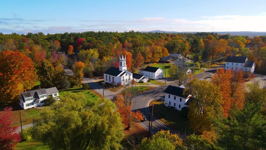 Chichester United Methodist Church aerial view in fall at 45 Main Street in historic town center of Chichester, New Hampshire NH, USA. 