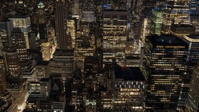 A night time lapse clip of down town Manhatten in New York, USA with the millions of lights from the buildings