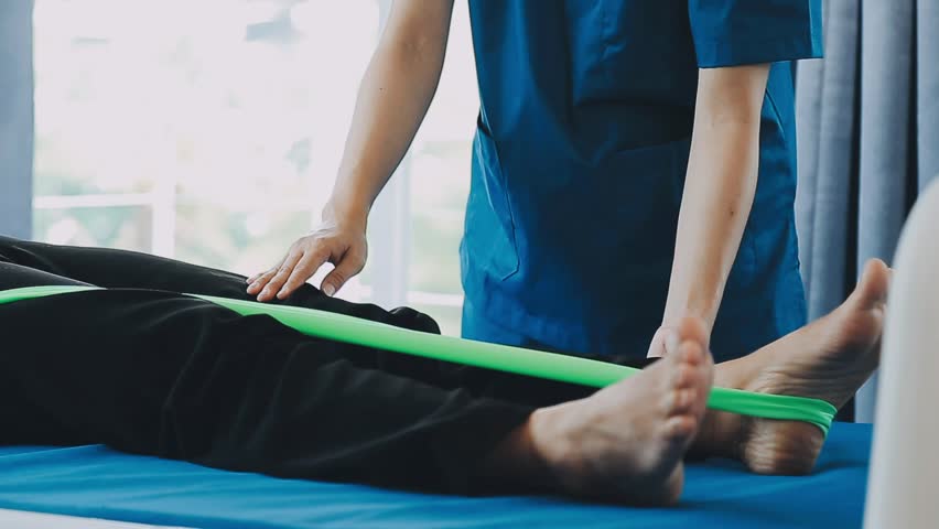 young asian physical therapist working with senior woman on walking with a walker

 Royalty-Free Stock Footage #1103977991