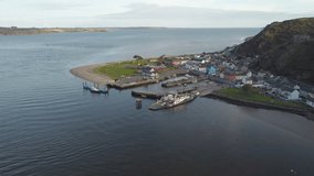 Drone River Suir, Ireland - Aerial view of The Passage East Ferry across River Suir linking the villages of Passage East in Co. Waterford and Ballyhack in Co. Wexford - Powered by Shutterstock - Get 15% off with code: PIKWIZARD15