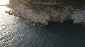 4k video. Shooting from a drone. Montenegro. Petrovac. Rocks of the coast under the health trail.