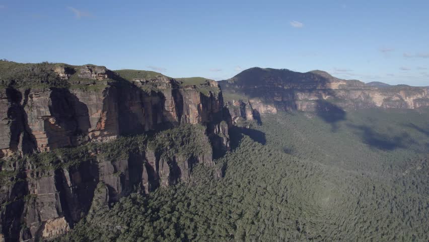 Walls Lookout - Escarpment Of Mountain With Dense Forest During Summer In Blue Mountains National Park, Australia. - aerial
