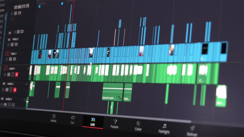Close up of video editing time line and computer monitor as video editor works on edit editing on computer. fix work of program for video editing, video processing, post-production, clip maker Royalty-Free Stock Footage #1104002843
