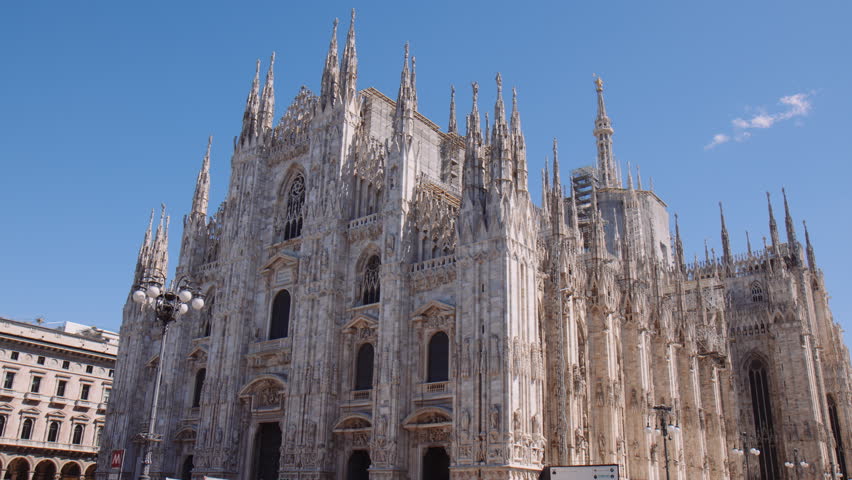 Famous Architecture Of Duomo di Milano Cathedral In Milan, Lombardy Italy. Low Angle Royalty-Free Stock Footage #1104003501