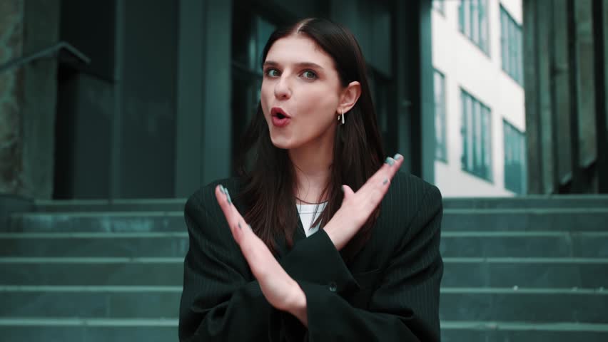 No, Young beautiful caucasian business Woman Rejecting Offer by crossing hands and waving head oudoors urban city skylines