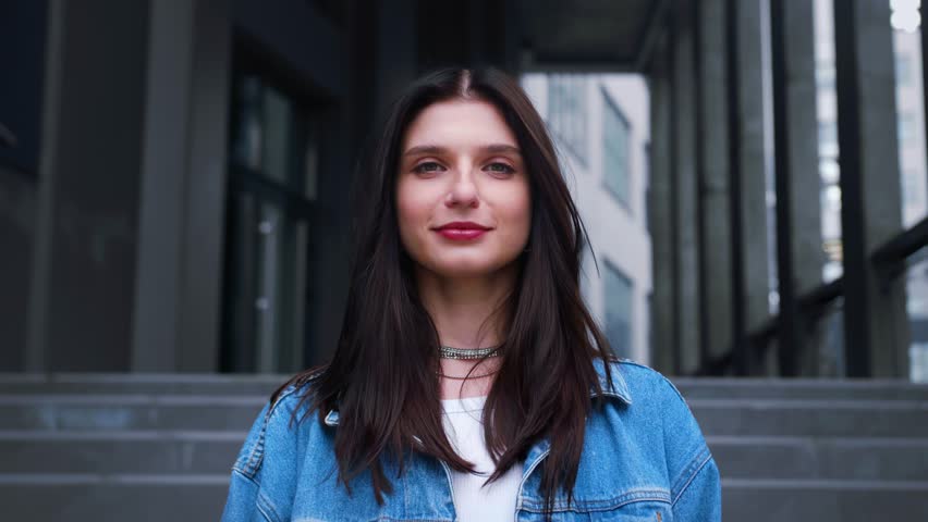 Yes, I Agree. caucasian Woman Nodding Head In Approvement Smiling To Camera Posing outdoors urban city. Positive Answer Concept. Slow Motion