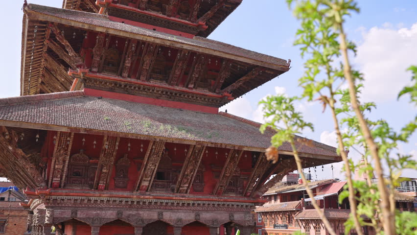 Tracking the beautiful ancient Hindu Nyatapola Temple showing the carved wooden detail, Bhaktapur Durbar Square, Kathmandu Valley, Nepal