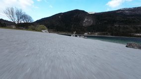FPV Flight Towards The Wooden Eagle Sculpture On The Rock In The Shore Of Lake Molveno In Italy. - aerial - Powered by Shutterstock - Get 15% off with code: PIKWIZARD15
