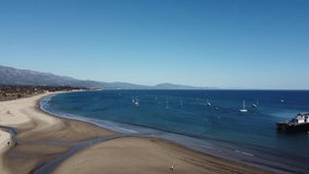 Aerial Drone Video of Santa Barbara California Beach with Blue Skies Beach Surf and Sand