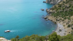 The yacht docks to the shore with vacationers. Yacht on the beach, shot from above. Beach with vacationers, taken from the air. - Powered by Shutterstock - Get 15% off with code: PIKWIZARD15