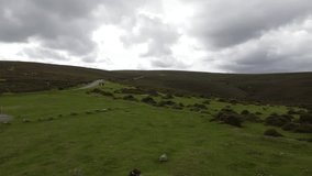 Drone footage of the British countryside all the hills and valleys views for miles England nature on a sunny and cloudy day - Powered by Shutterstock - Get 15% off with code: PIKWIZARD15