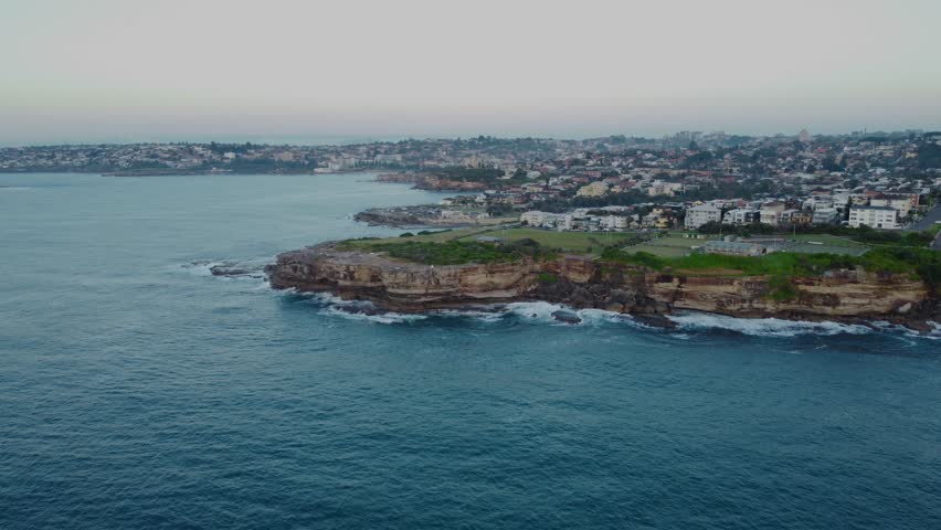 Beautiful Bronte Beach and surrounds during a gloomy sunrise. Sydney, Australia.