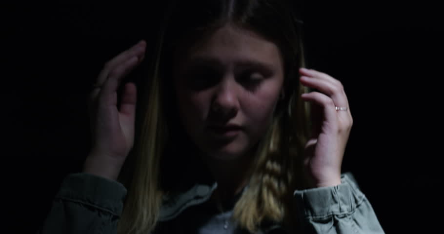 Child, scream and fear with stress in the dark is at risk of human trafficking or abuse. Kid, anxiety and screams with terror and mental health at night with violence and trouble for scared victim. Royalty-Free Stock Footage #1104030881