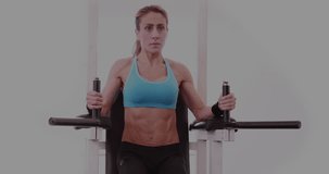Animation of data processing over fit caucasian woman exercising. Global sport, fitness, computing and data processing concept digitally generated video.