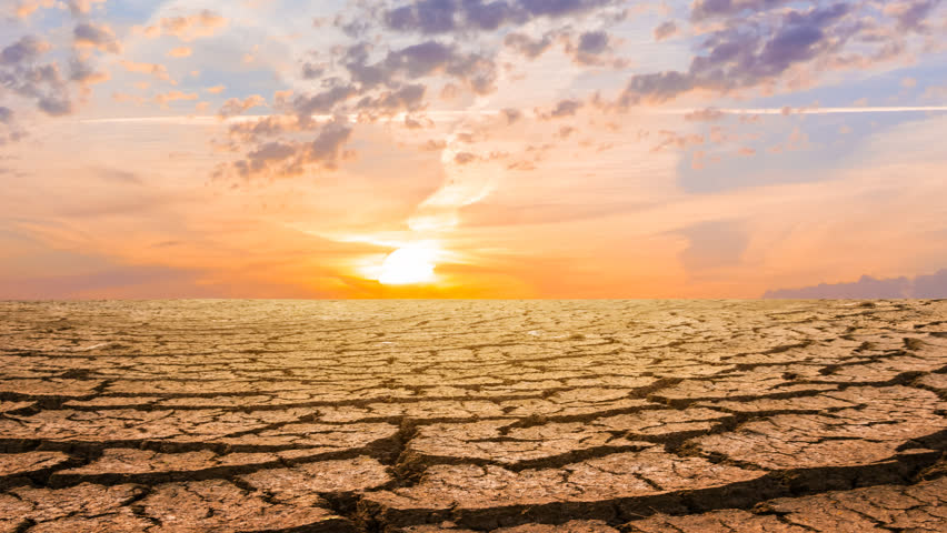 dry cracked waterless plain at the sunset, dramatic ecological disaster time lapse scene Royalty-Free Stock Footage #1104066723