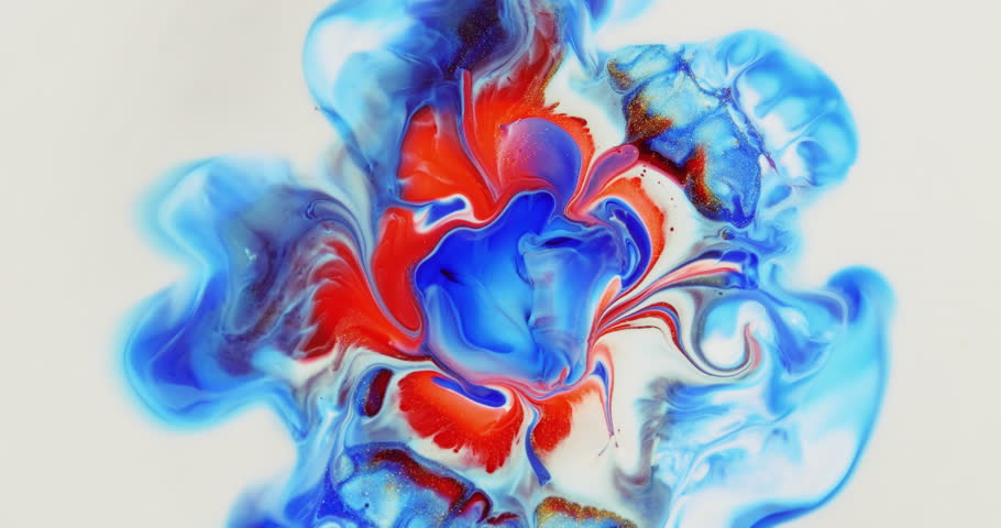 On a white background, a divergent blurry circle of red and white, blue colors. Ink space with a golden sheen. Abstract art of applying multicolored ink. Movable colorful background of paint of