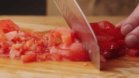 Chop tomato close up, Diced tomatoes on a cutting board for Italian sauce, chef cut tomatoes with knife.  - Powered by Shutterstock - Get 15% off with code: PIKWIZARD15