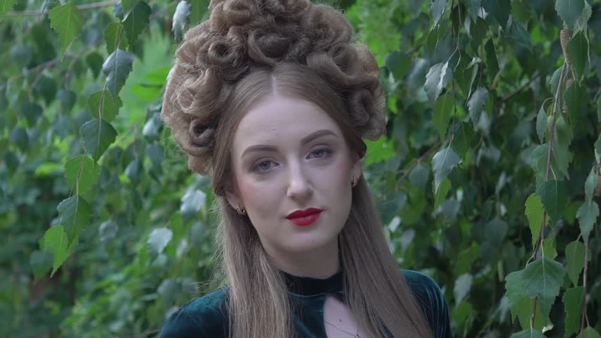 Slow Motion Fantasy fairytale Girl in garden