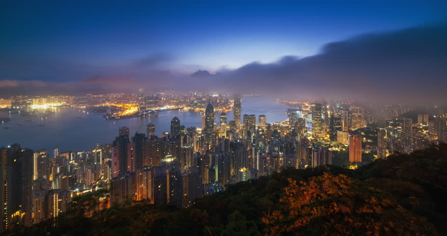 4K Timelapse night to sunrise aerial view of Hongkong city skyline view form Victoria peak , China 
