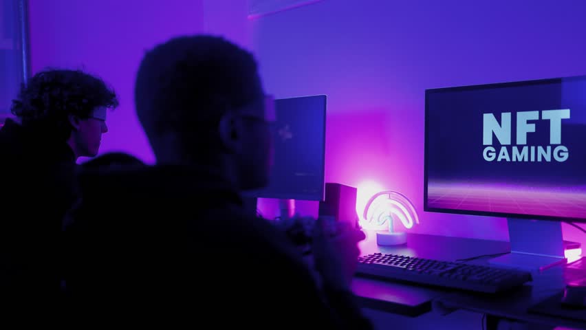 Young gamers buying NFT with token on marketplace platform for metaverse video game - Crypto technology trend - Powered by Shutterstock - Get 15% off with code: PIKWIZARD15