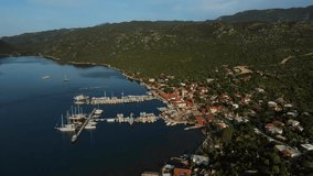 Drone Adventures in Kaleüçağız: Captivating Aerial Views of Turkey's Coastal Town and Vibrant Port