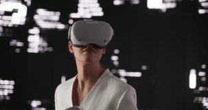 Young Female Wearing a Virtual Reality Headset and Using Controllers in a Futuristic Cyber Room with Technological Digital Animation. Futuristic Businesswoman Exploring VR Metaverse, Doing Work Online