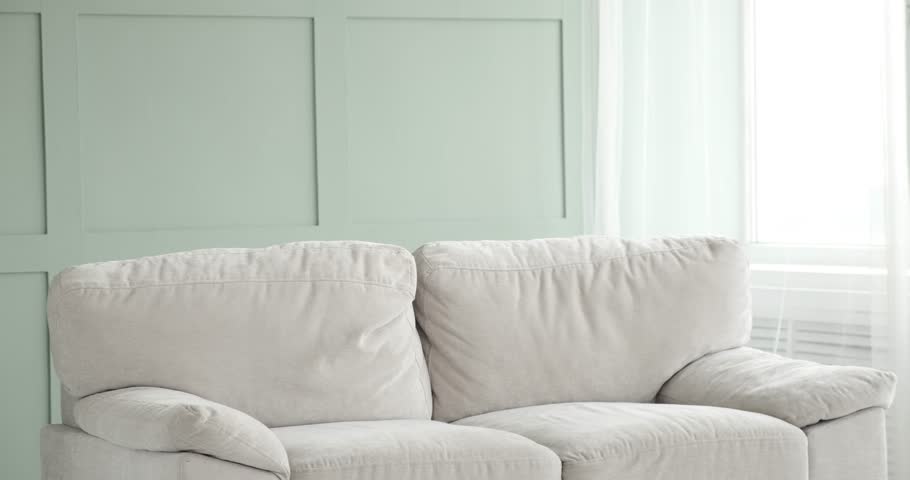 Indian man receiving and unboxing parcel with joy