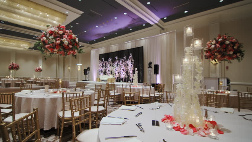 A large hall for celebrations. Interior of a wedding hall wedding decoration. Wide shot | Shutterstock HD Video #1104110321