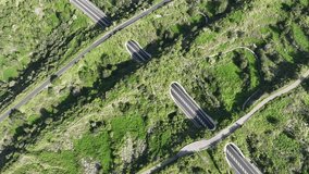 Aerial video of highway with ecoducts to allow for safe passage of wildlife on Tenerife, Spain