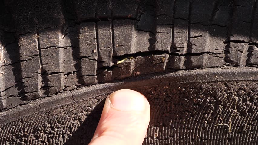 Old Car Tire With Cracks
