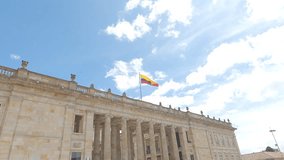 Video recorded in 4k of the Colombian flag over the Congress in the Plaza de Bolivar in Bogota.