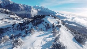 FPV drone shot of a beautiful snowy landscape in Chamrousse, a french ski resort near Grenoble.
