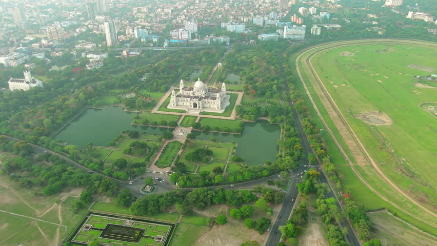 Kolkata: Aerial view of city in India, famous Victoria Memorial, large marble building on Maidan - landscape panorama of South Asia from above