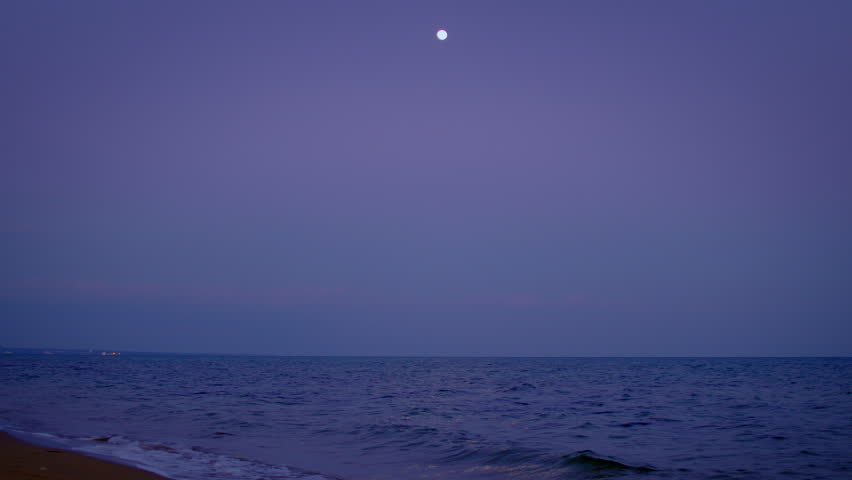 Full moon, moon over sea surface at night, camera tracking
