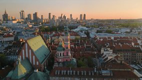 warsaw city aerial view drone at sunset over old town and market square