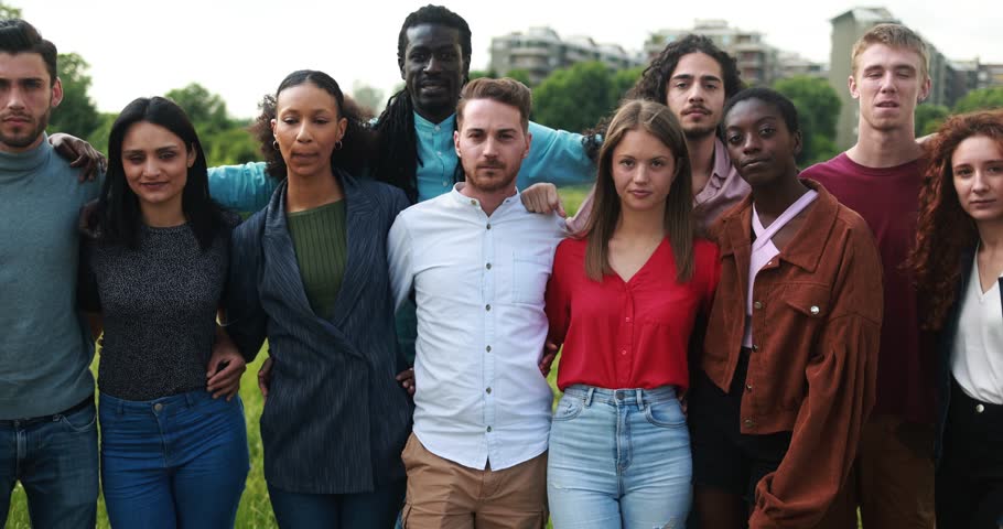 Young friends looking serious on camera outdoor  
