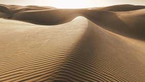 Close up of rippled texture on sand surface in desert nature in low sunshine. Incredible shot strong wind blowing sand. Shiny golden sand on top of rippled dunes in sunset cinematic aerial background - Powered by Shutterstock - Get 15% off with code: PIKWIZARD15