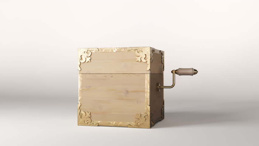 An ornate antique jack-in-the-box made of wood and gold trimmings getting wound up and then popping open on an isolated white studio background  Royalty-Free Stock Footage #1104128737