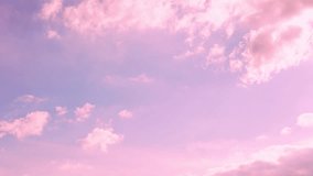 Beautiful Aerial View of Delicate Pink Blue Sky with Puffy Cotton Clouds at Dawn in Sun light. Soft Colorful Sunrise Summer Sunny Skyscraper and Fluffy Cumulus Clouds Time Lapse, Atmosphere, Beauty. - Powered by Shutterstock - Get 15% off with code: PIKWIZARD15