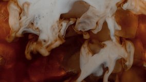 Super Slow Motion Shot of Pouring Milk into Coffee with Ice Cubes . Filmed on High Speed Cinematic Camera at 1000 FPS - Powered by Shutterstock - Get 15% off with code: PIKWIZARD15