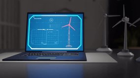 Laptop computer Display of electrical energy cost and total electrical output from wind turbines. Presented as a User Interface, holographic graphics, energy and environment technology concept. 