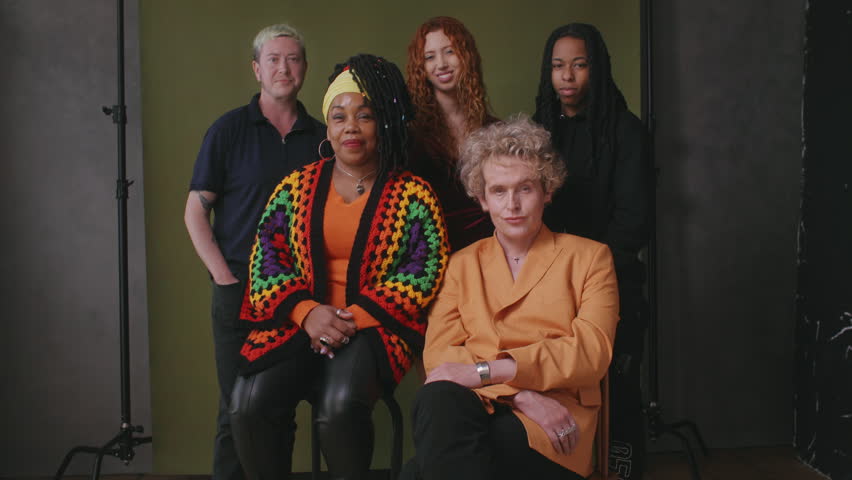 Five LGBTQIA queer people against studio backdrop Royalty-Free Stock Footage #1104148067